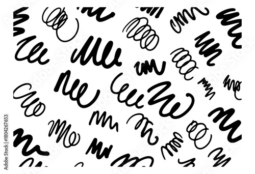 Hand drawn pattern of abstract black scribbles, squiggles, and swirls