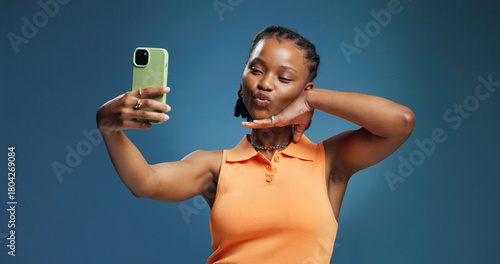 Obraz na plátně Pout, selfie and social media with black woman in studio for profile picture or status update