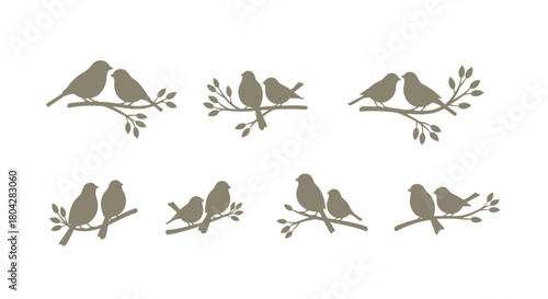 Collection of bird silhouettes, featuring pairs of small birds perched on tree branches, in various romantic and natural poses.