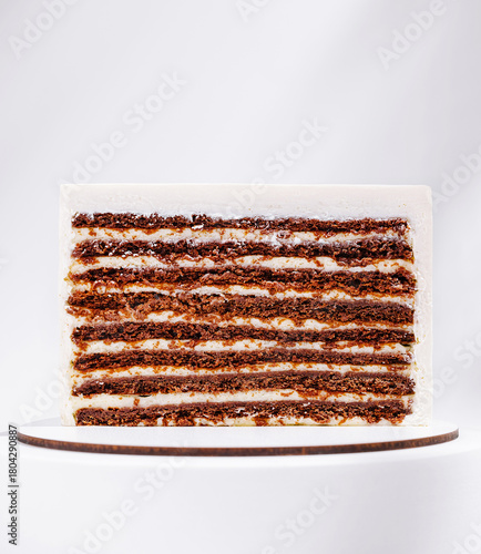 Layered chocolate and cream dessert in a neat stack