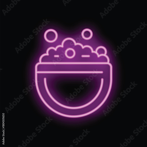 Neon sign of a basin full of water and soap suds, perfect for a launderette