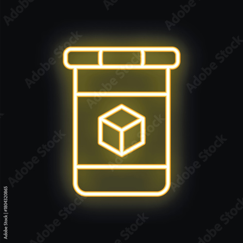 Neon yellow medicine bottle is glowing on black background with a cube on the label