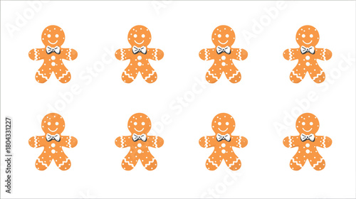 Eight smiling gingerbread men cookies with white icing decoration isolated on white background. Holiday Christmas treat.