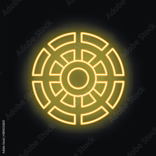 Yellow neon sign in the shape of a dharma wheel is glowing on a black background