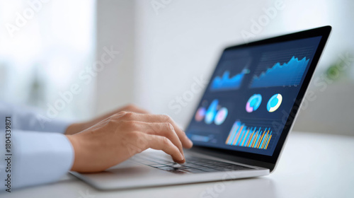 Professional analyst concentrating on business report displayed on computer. screen shows dashboard with analytics, charts, and graphs for market research