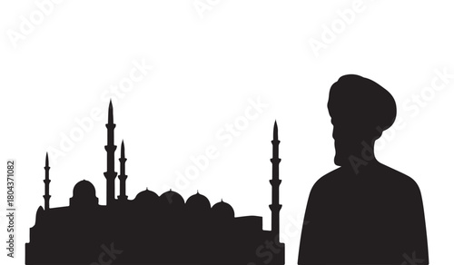  Silhouette of a man in a turban standing before a mosque with minarets