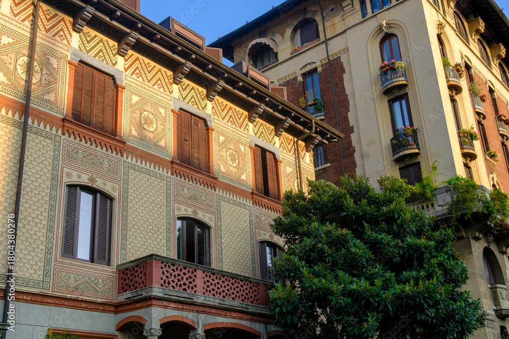 Naklejka premium Historic residential buildings along via Eupili in Milan, Italy