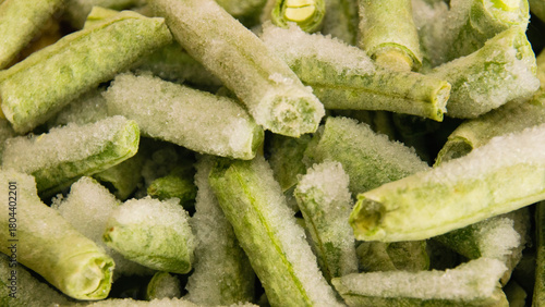 Frozen asparagus beans close-up. Food preparation and storage concept