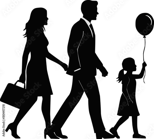 Silhouettes of a walking family holding hands together