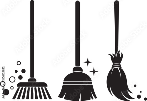 Collection of three black broom icons representing different cleaning tools and methods