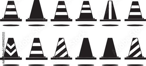 Collection of black traffic cones with white stripes and chevron patterns