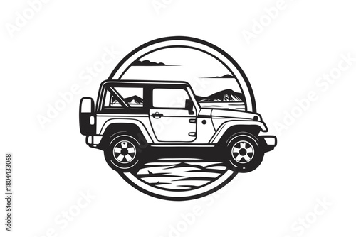 black and white all terrain vehicle travels through a sandy landscape