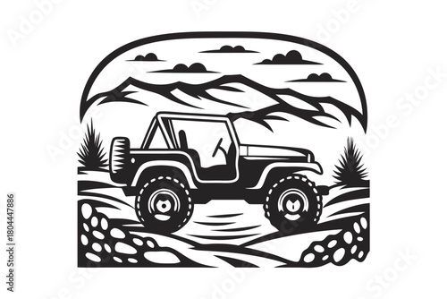 Black off road vehicle traverses rugged terrain against mountain landscape backdrop creating an adventurous scene