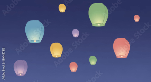 Sky lanterns floating in the night sky, creating a festive and celebratory atmosphere.