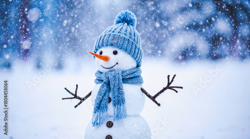 Joyful snowman wearing a blue hat and scarf in a snowy forest