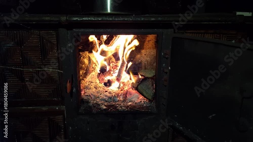 Building a warm fire in a traditional stove