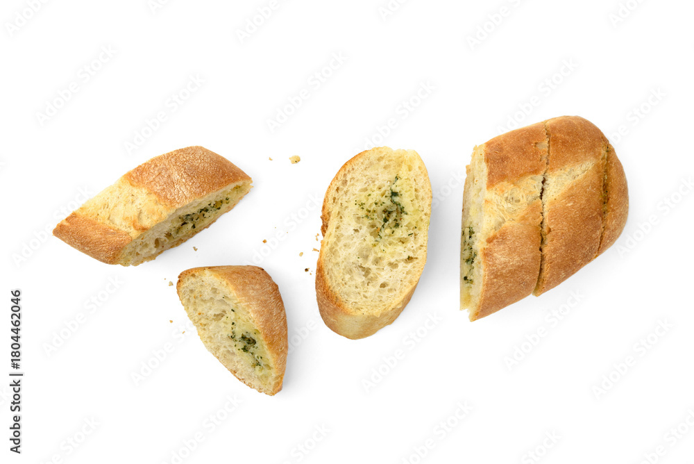 Obraz premium Sliced baguette with garlic isolated on white background.