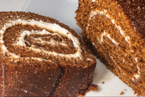 close up photo of some chocolate swiss roll cake