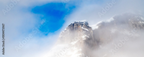 Winterlandscape  mountains with snow, ice and blue sky on spitsbergen Norway