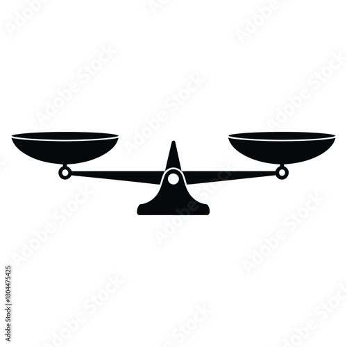 Black silhouette of a traditional balance scale on a white background