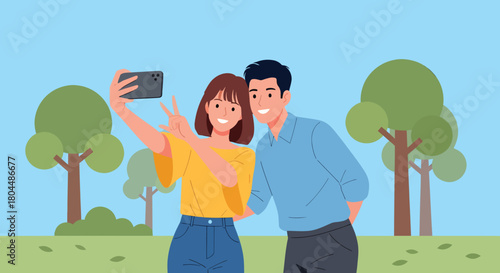 Joyful couple taking a selfie in a park, capturing a happy memory with a peace sign gesture outdoors