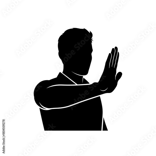 Silhouette of man making stop gesture with raised hand and copy space