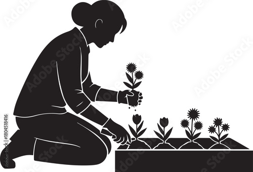 Silhouette of a person planting flowers in a garden bed outdoor hobby activity