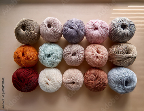 Soft Colorful Yarn Balls on a Cozy Background