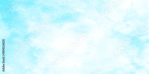 Light blue blurred grainy and cloudy sky with soft clouds, cloudy and shiny blurred grainy soft splashed texture, bright grunge sky light blue watercolor background.