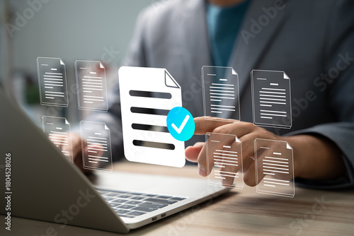 Task management and digital checklist concept. Businessman using stylus on tablet with virtual checklist icon for workflow planning, productivity, approval process, and organized project tracking.