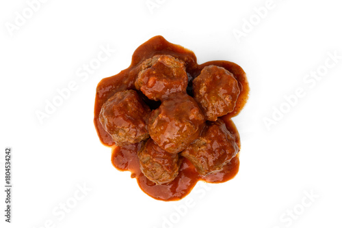 Fish meatballs in tomato sauce isolated on white background.