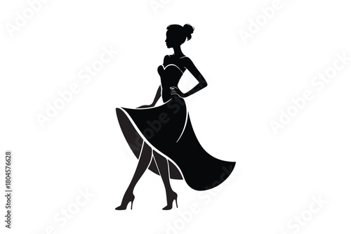 Elegant silhouette of a woman in a flowing evening gown