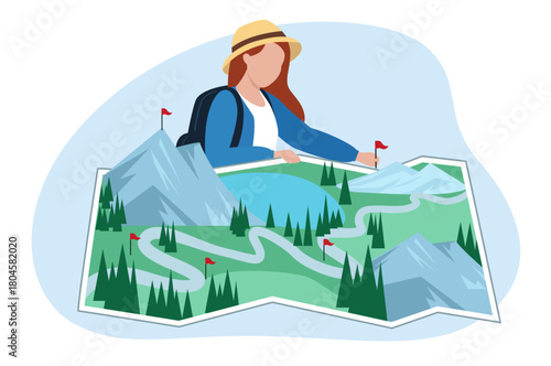 A woman planning a hiking route on a map, marking destinations with flags.