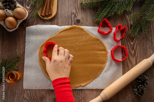 making homemade Christmas cookies on a wooden background. flat lay
