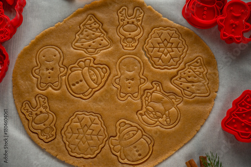 making homemade Christmas cookies on a wooden background. flat lay