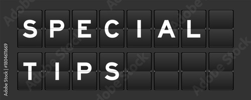 Black color analog flip board with word special tips on gray background