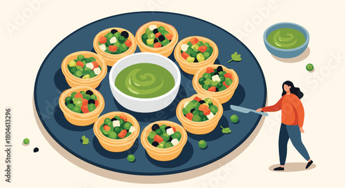 A woman prepares small filled tartlets with a side of green dip for a snack.