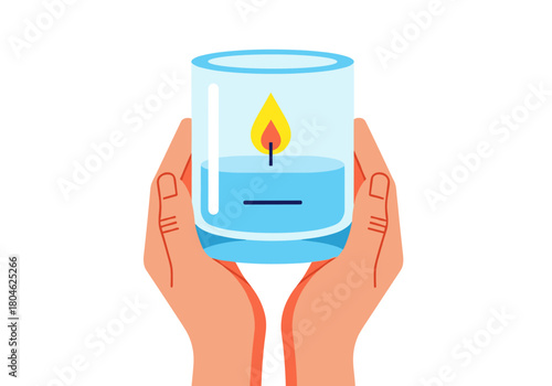 Two hands holding a lit candle in glass jar for Christmas and New Year  