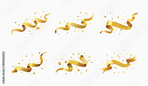 Collection of celebratory golden ribbons and confetti elements on a white background