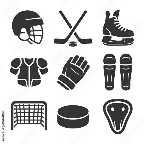 Ice hockey gear set: helmet, sticks, skates, pads, gloves, goal, puck.