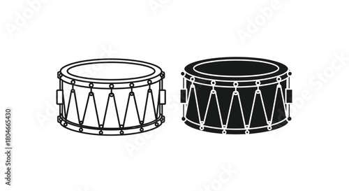 Two side-by-side illustrations of snare drums, one in outline and the other filled in.