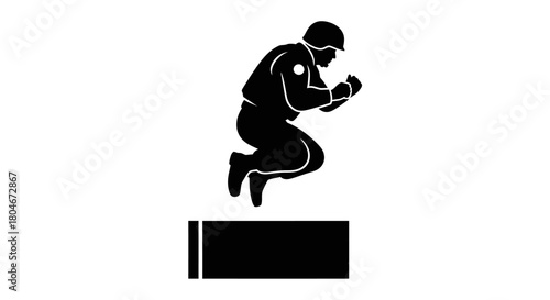 Silhouette of a soldier jumping over a rectangular obstacle with clenched fists.