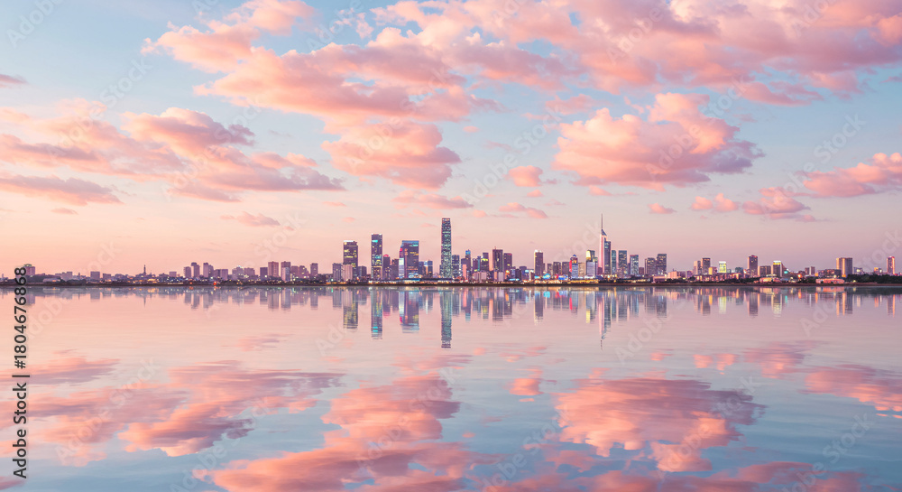 Naklejka premium Pastel City Skyline Mirrored in Water