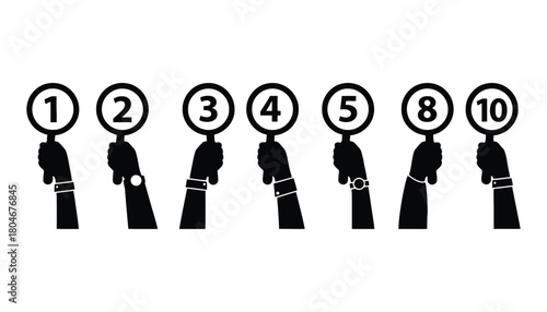 Hands holding up score cards with numbers one two three four five eight ten