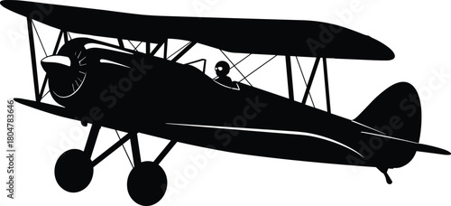 Vintage biplane silhouette, early aviation aircraft, open cockpit pilot, WWI airplane, propeller plane, historical flight, retro aircraft, black and white image