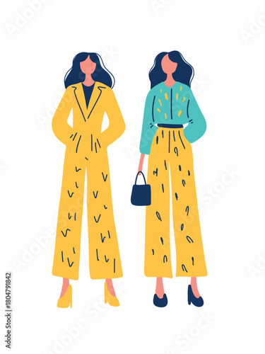 two stylish women in full-length view wearing sophisticated outfits