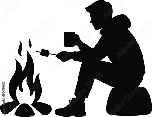 Silhouette of a person sitting by a campfire roasting a marshmallow woman