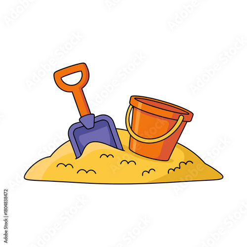 Colorful toy shovel and bucket in sandpile for summer beach fun