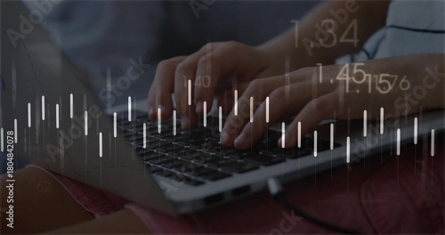 Typing hands tapping keyboard at home on lap, showing laptop, cable, pink garment, data overlay