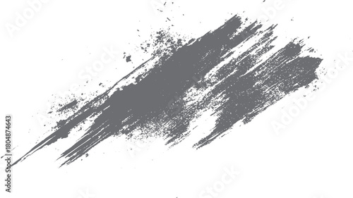 Gray distressed paint brush stroke texture with splatter and speckle effects on a white background abstract